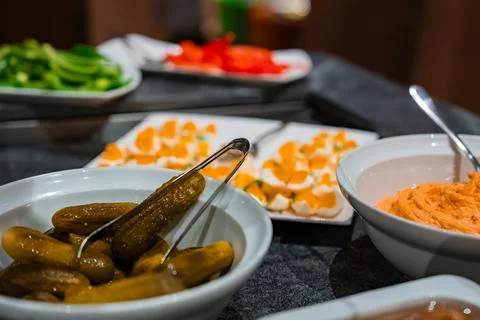 Buffet appetizers in Oberlech, Austria, with deviled eggs and pickles Stock Photos