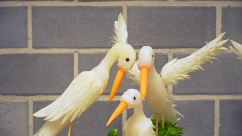 Buffet: beautiful shape of swans from the radish Stock Footage 82447956