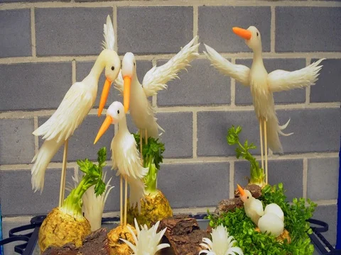 Buffet: beautiful shape of swans from the radish Stock Footage 82448189