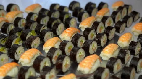 Buffet, black and white rolls lie on a plate Video stock 197864742