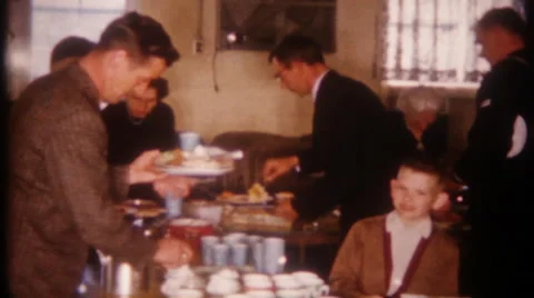 Buffet breakfast at church on Sunday morning 1950s vintage film home movie 2924 Stock Footage