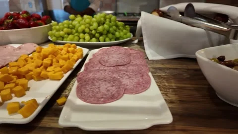 Buffet Breakfast Has Meats Cheeses and Fresh Fruit Vídeos de archivo 318006279