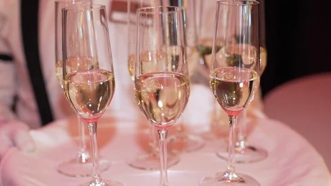 Buffet, champagne glasses stand on a tray 库存影片 105009547