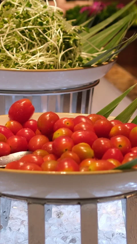 Buffet choose vegetables pick tomatoes cucumbers food free lots delicious Stock Footage 311925265
