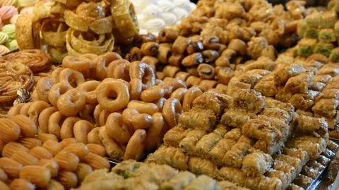 Buffet dessert stand, marshmallows, donuts and baklavas Video stock 103473359