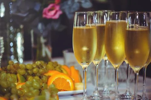 Buffet. The dining room is full of glasses of sparkling white wine with canap Stock Photos