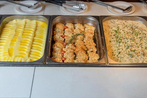 Buffet in the dining room-mashed potatoes, cutlets, beef in sauce. Smorgasbor Stock Photos