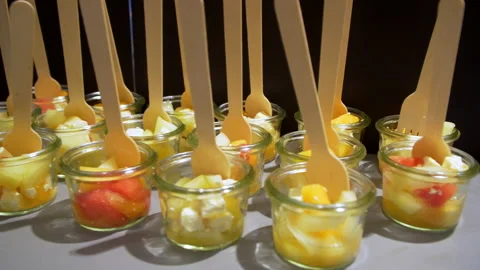 Buffet dishes stand beautifully on the table Stock Footage 235581245