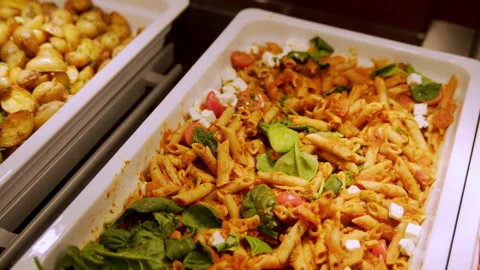 Buffet dishes stand beautifully on the table Stock Footage 235581390