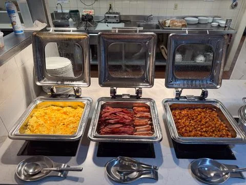 Buffet display of breakfast items on a commercial counter Stock Photos