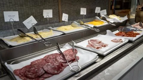 Buffet Display with Sliced Salami Cheese and Cold Cuts Stock Photos