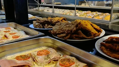 Buffet Food Display with Fried Chicken and Prepared Meals Video stock 338203350