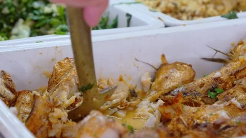 Buffet food service involves people serving themselves from a selfservice line Stockbeeldmateriaal 276420580