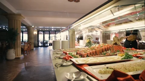 Buffet with fresh dishes with background waitress Stock Footage 86737026