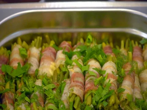 Buffet: green beans wrapped in bacon Stock Footage 80498504