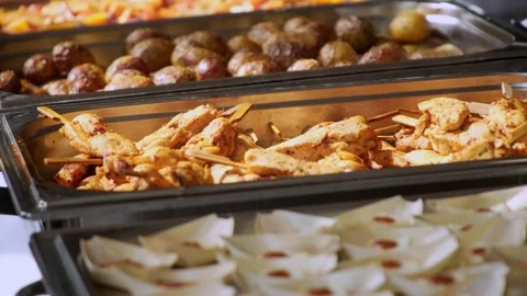 Buffet, guests put food on their plates Vidéo 247684447
