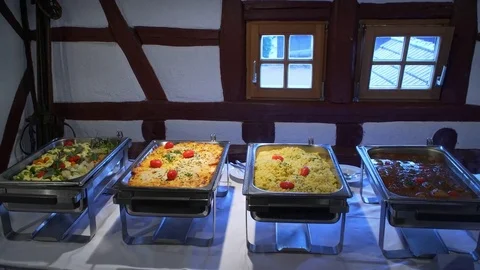 Buffet: hot dishes are on the table Stockbeeldmateriaal 79381686