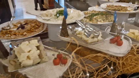 Buffet at the hotel. Cheeses, salads Stock Footage 252803112