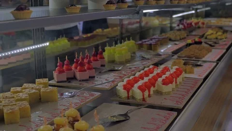 Buffet with a large selection of dessert. The concept of food, hotel, restaurant Stock Footage 80582922