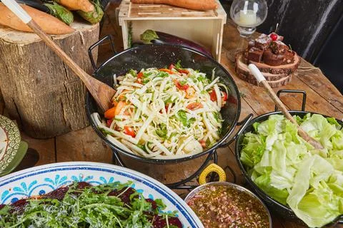 Buffet with a large selection of vegetable dishes and salads, healthy food Stock Photos