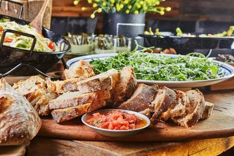 Buffet with a large selection of vegetable dishes and salads, healthy food Stock Photos