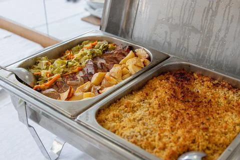 Buffet lunch served at a catered event. Stock Photos