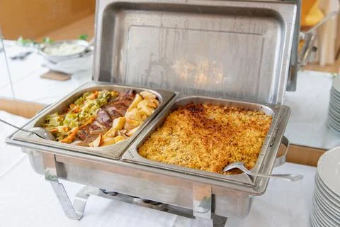 Buffet lunch served at a catered event. Stock Photos