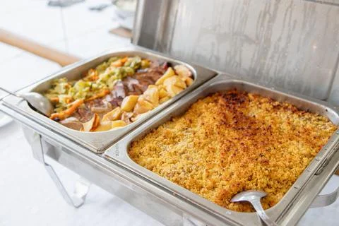 Buffet lunch served at a catered event. Stock Photos
