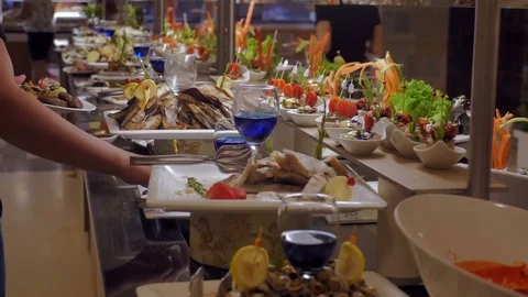 Buffet in a luxurious restaurant with fish, snacks and vegetables. Celebration Stock Footage 80630890