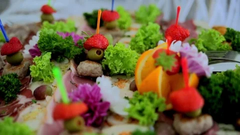 Buffet, meat and fruit looks beautiful on the plate Video stock 69748588