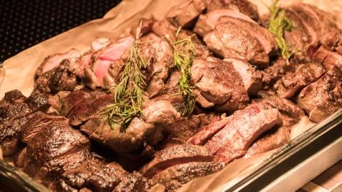 The buffet is the meat under the lamp Photos