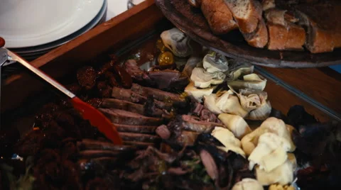 The buffet is nice meat and vegetables Video stock 68990250