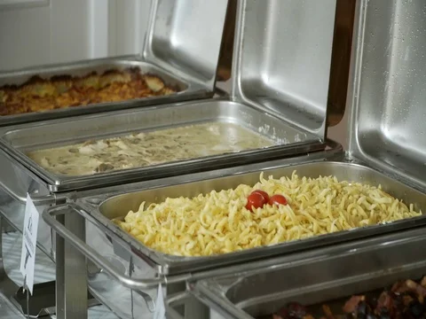 Buffet: open cover with hot dishes Stock Footage 81531953