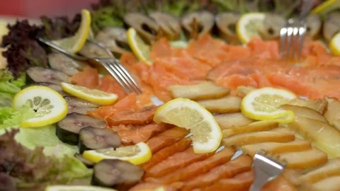 Buffet, red and white fish lies on a plate Stock Footage 197864943