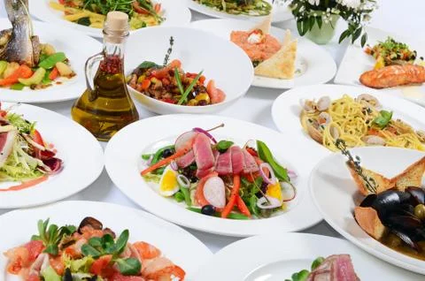 The buffet in the restaurant with different meals Stock Photos