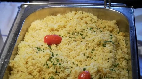 Buffet: rice with tomatoes and herbs Stock Footage 79384920