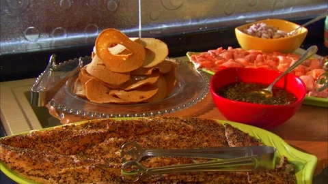 Buffet with salmon capers bagels and other breakfast items  Stock Footage 123774552
