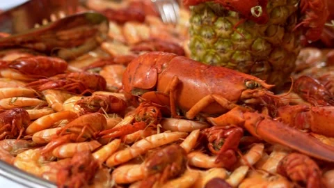 Buffet, shrimp and crayfish lie on a plate Stock Footage 197865017