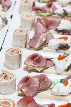 Buffet with snacks from fish and meat Stock Photos