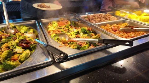 Buffet Spread Featuring Seafood and Vegetables in Vibrant Setting Stock Footage 281501273