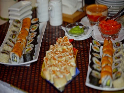 Buffet, sushi and rolls on the plate 스톡 동영상 73565292