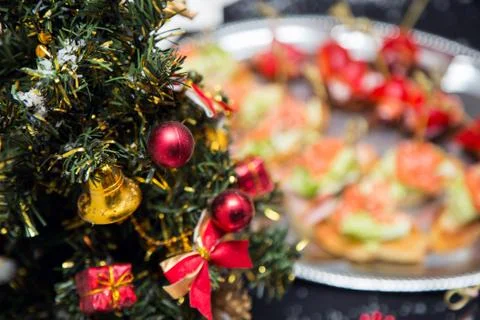 Buffet table with canape and red fish Фото
