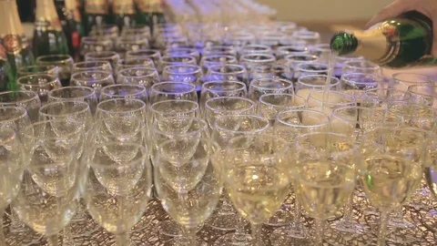 Buffet table, champagne is poured into glasses Stock Footage 72931596
