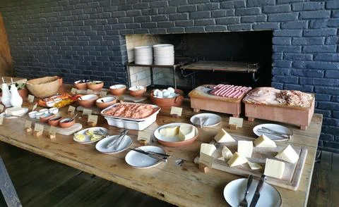 Buffet table with cheese, cold cut, vegetables Foto stock