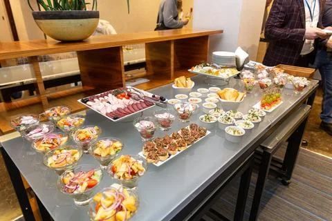 Buffet table with cold appetizers and salads. Photos