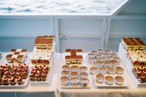 Buffet Table with Desserts and Ocean View Stock Photos