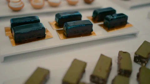A buffet table with different types of desserts Stock Footage 231427540
