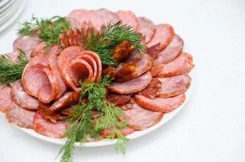 Buffet table with fruit and meat snacks and canapés Stock Photos