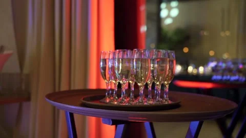 A buffet table with glasses and champagne in the restaurant Stock Footage 172393545