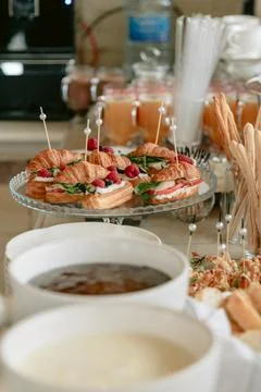 Buffet table with gourmet appetizers prepared for festive catering event Stock Photos